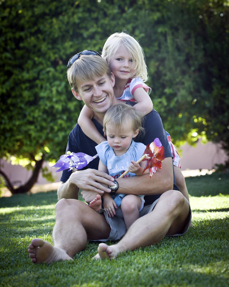 Shane Peterson was photographed with his two daughters at a Henderson park in the summer of 201 ...