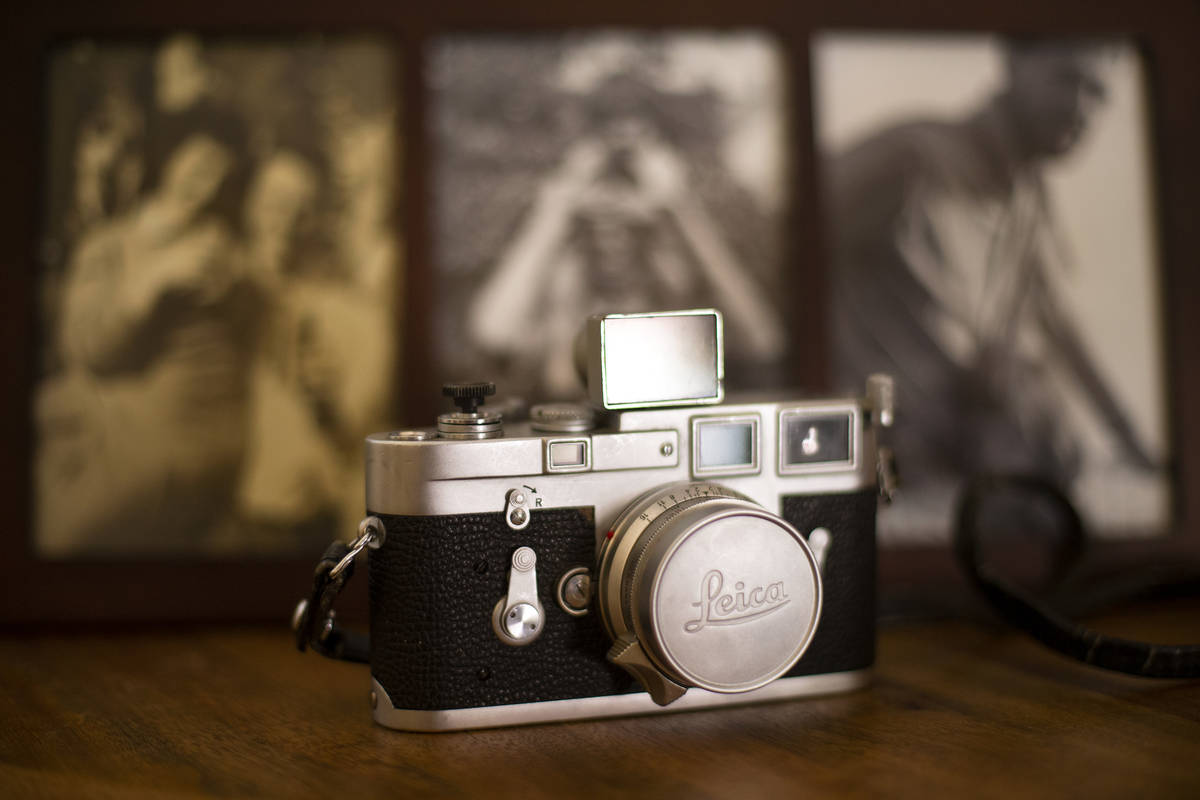 Ted Polumbaum's Leica camera is placed in front of family photographs at his daughter's home. J ...