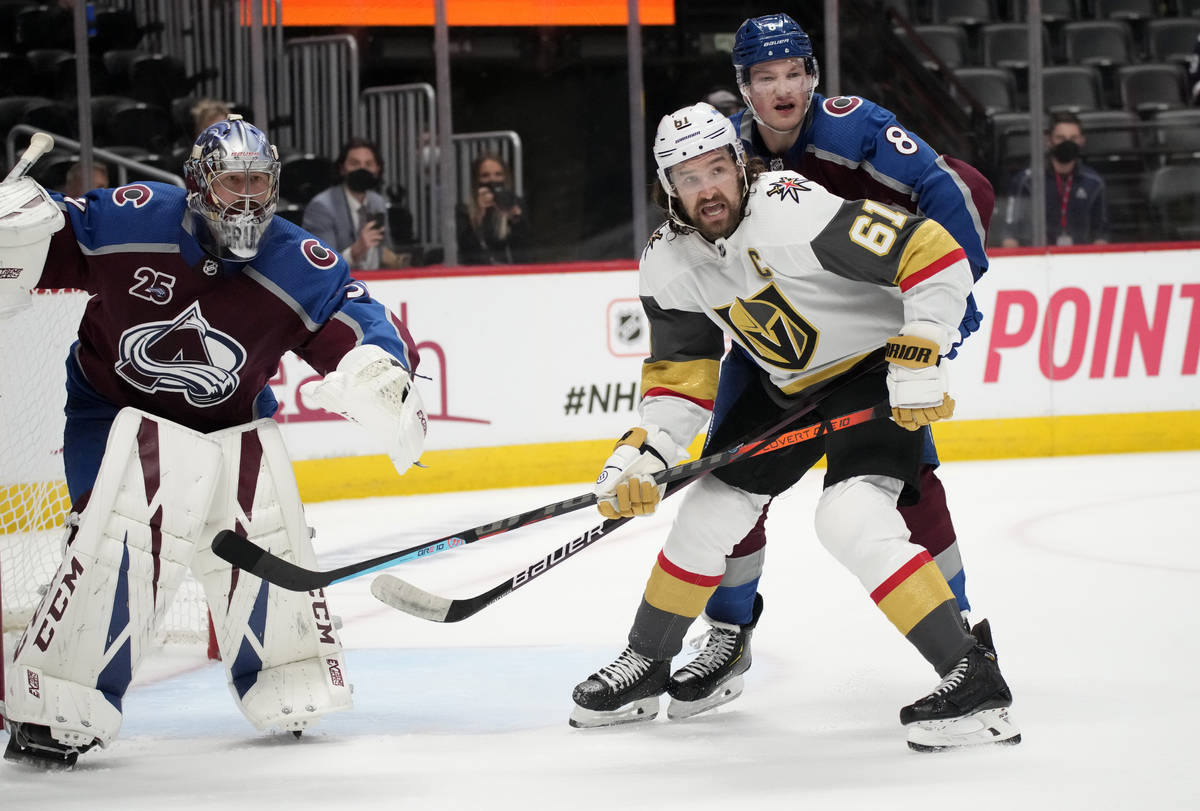 Vegas Golden Knights right wing Mark Stone, front right, calls for the puck while covered by Co ...