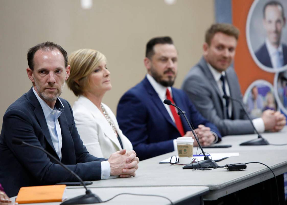 Clark County Commissioner Justin Jones, left, takes part in a Housing Resource Talk at Desert B ...