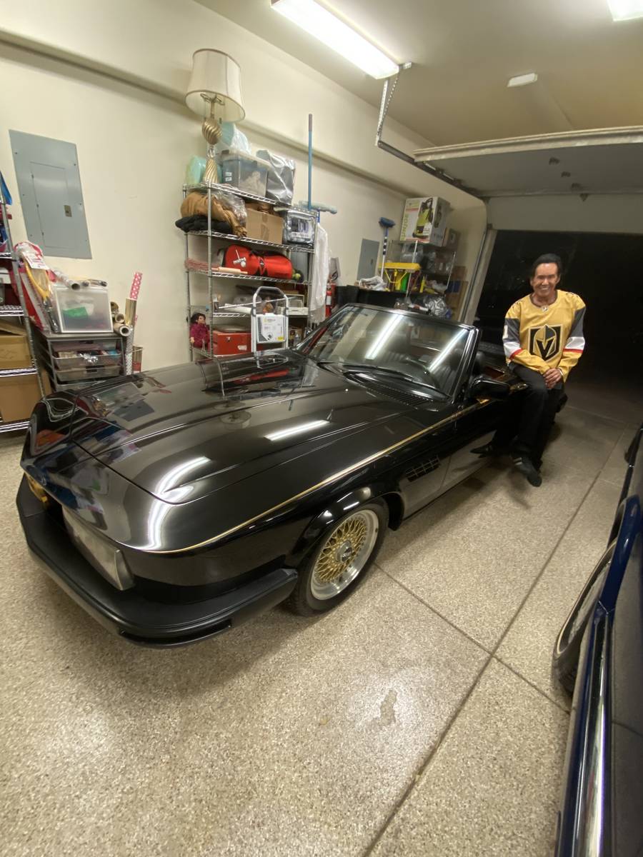 Wayne Newton is shown next to his 1981 Mercedes-Benz 380SL Custom Roadster up for auction at th ...