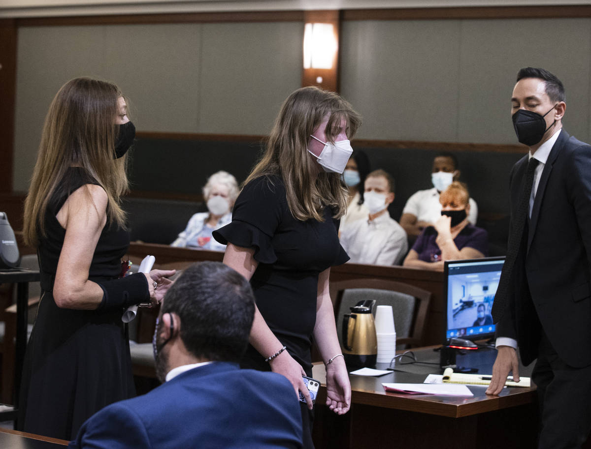 Angela Ahmet, left, and her daughter Jasmine, 17, leave the lectern after delivering their vict ...