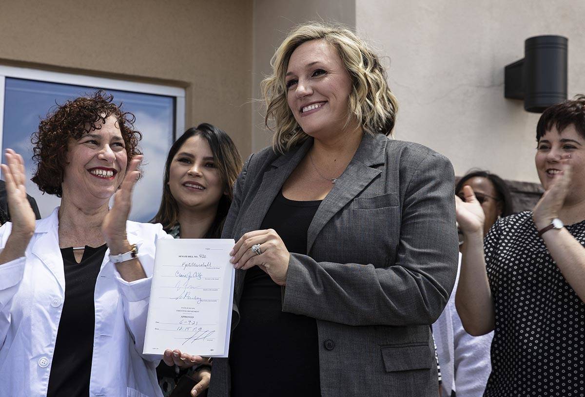 State Majority Leader Nicole Cannizzaro holds Senate Bill # 420, the bill that will provide a p ...