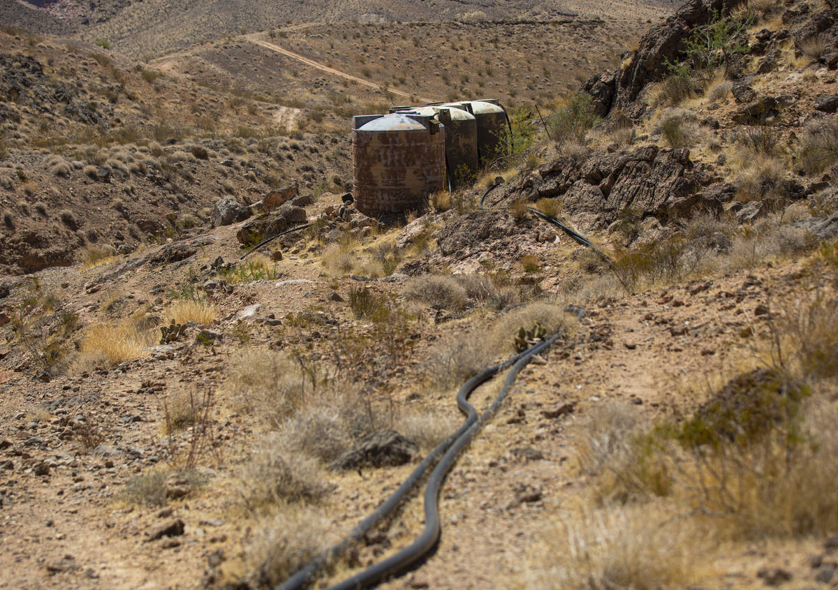 Old water guzzler tanks, which hold overflow water, are seen near the flipper guzzler in the Mu ...
