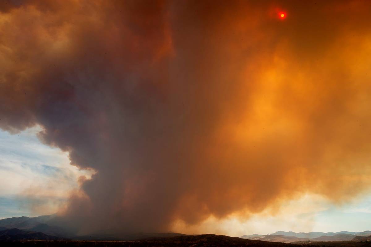 Smoke rises from the Telegraph Fire, on Monday, June 7, 2021, above Blue Lake, near Miami and G ...