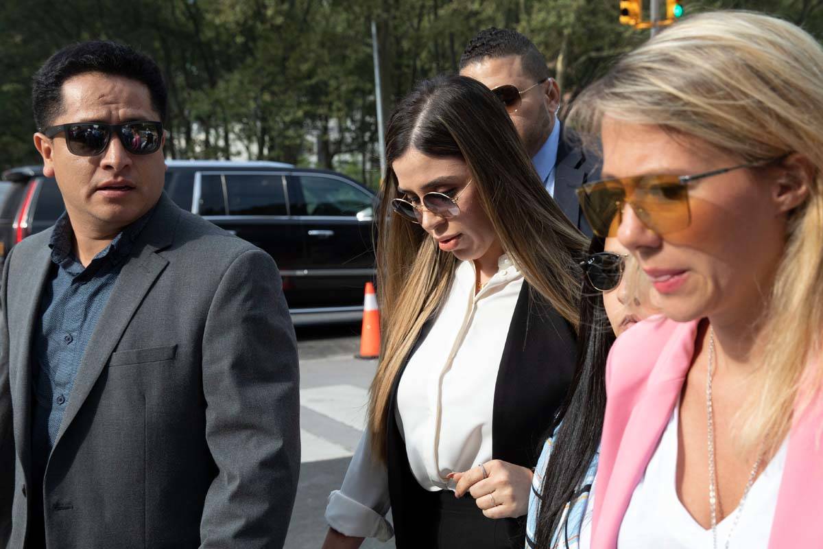 In this July 17, 2019 file photo, Emma Coronel Aispuro, center, wife of Mexican drug lord Joaqu ...