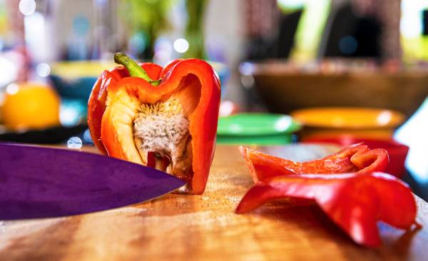 Regina Mitchell, a chef/instructor with Blindconnect, cuts red peppers on Friday, June 11, 2021 ...