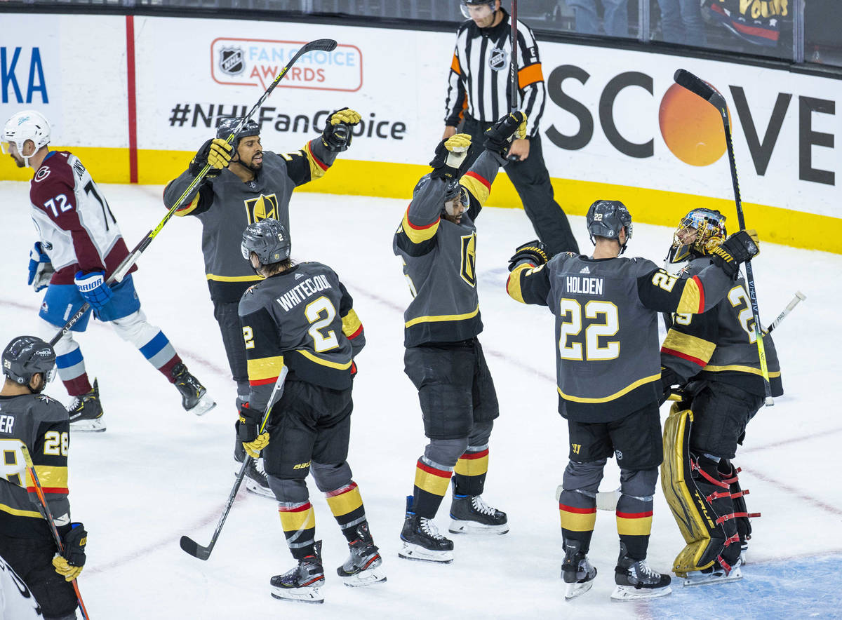 Golden Knights goaltender Marc-Andre Fleury (29) and teammates celebrate their 6-3 win over the ...