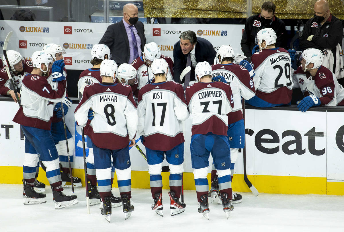 Colorado Avalanche head coach Jared Bednar designs a play for his players during the third peri ...