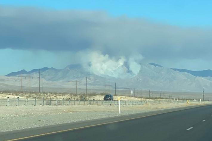 A plume of smoke rises from the Mount Potosi area. (Nye County via Twitter)