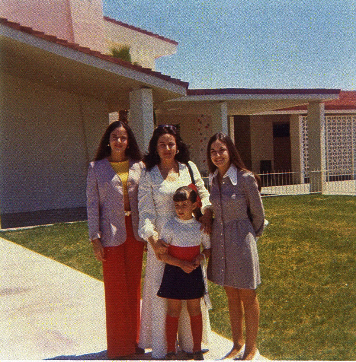 Lillam Lujan-Hickey (center) surrounded by her daughters, Lilliam Shell (left) Silvia Walsh (ri ...
