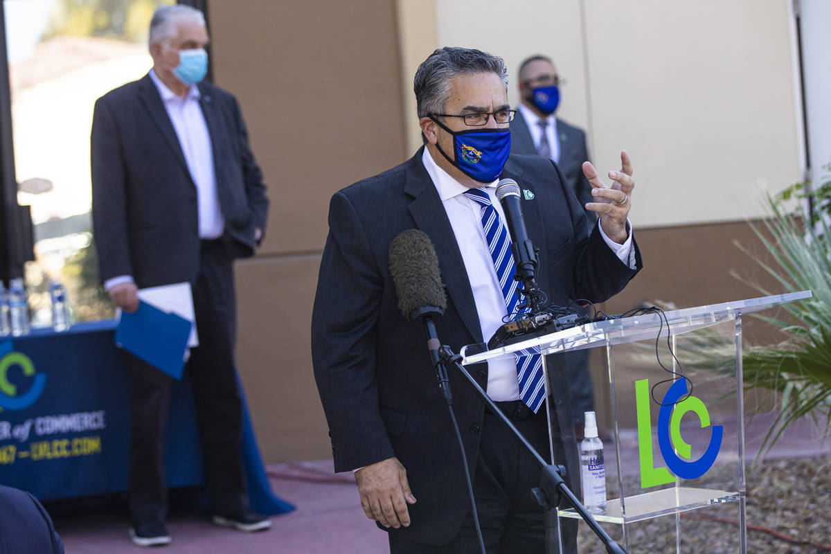 Peter Guzman, president of the Latin Chamber of Commerce, speaks during a press conference anno ...