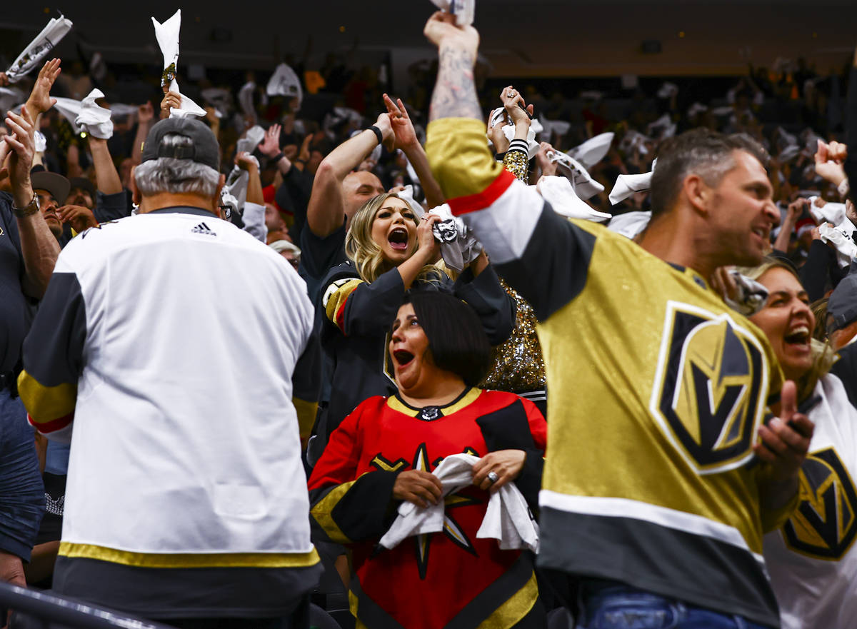 Golden Knights fans cheer after a goal by Patrick Brown, not pictured, during the third period ...