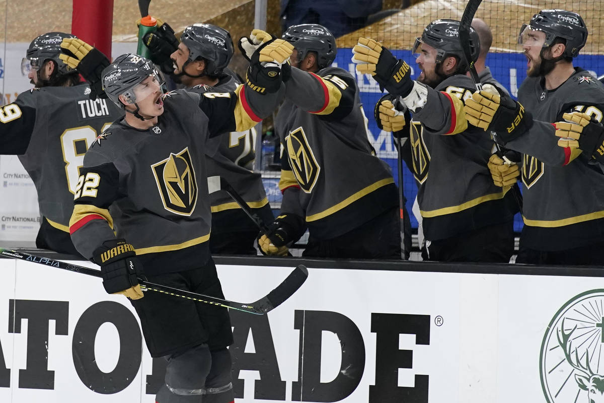 Vegas Golden Knights defenseman Nick Holden (22) celebrates after scoring against the Montreal ...