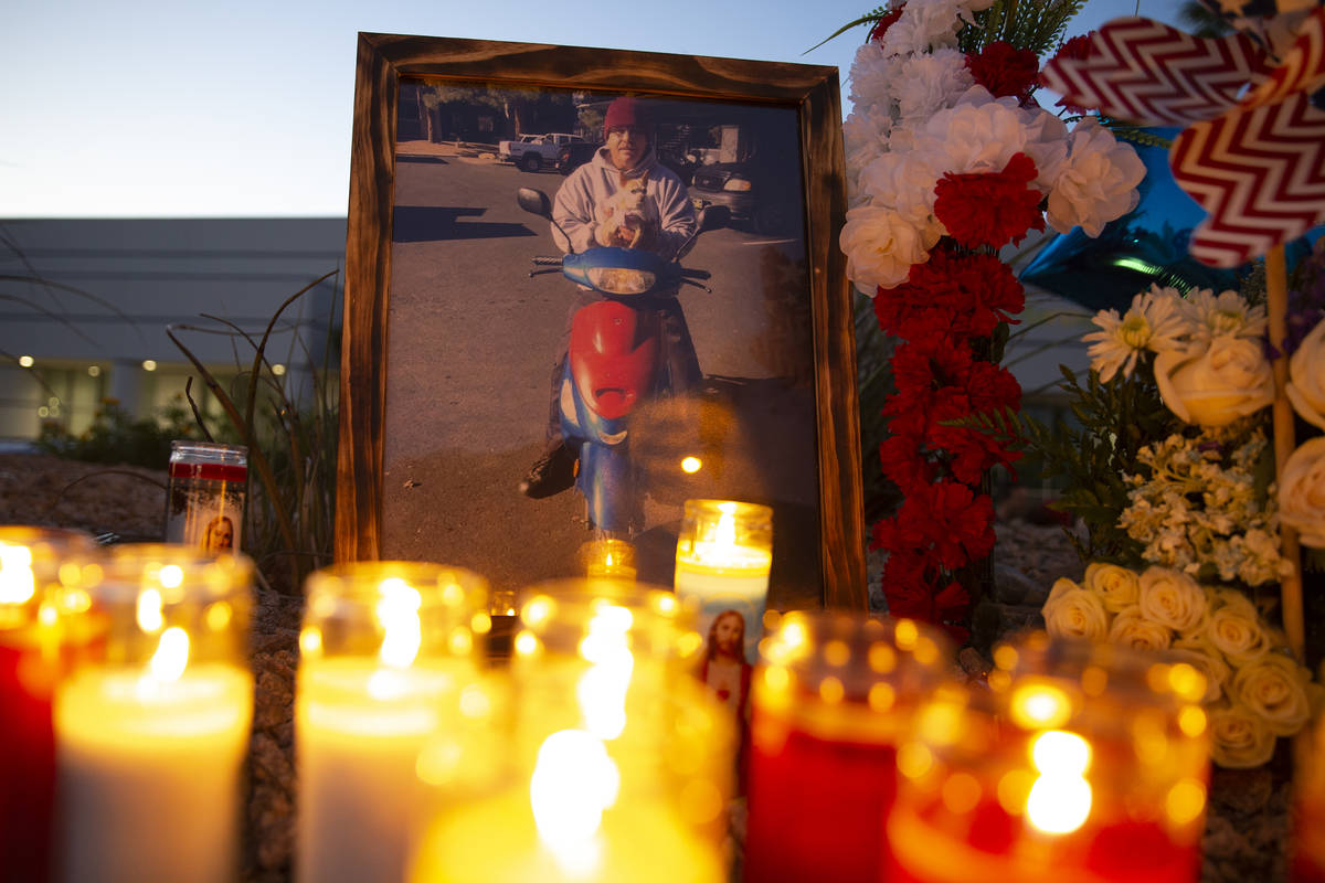 A photo of Walter Anderson on his moped during a vigil near the intersection where he was kille ...