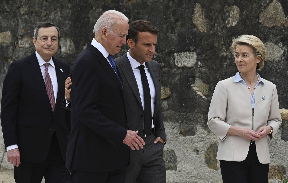 From left, Italian Prime Minister Mario Draghi, US President Joe Biden, President of France, Em ...