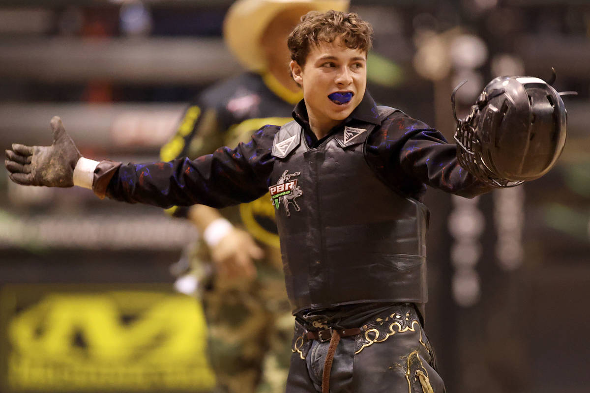 Bull rider Austin Richardson reacts after his run during the Professional Bull Riders Las Vegas ...