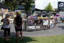 Visitors pay tribute to the display outside the Pulse nightclub memorial Friday, June 11, 2021, ...