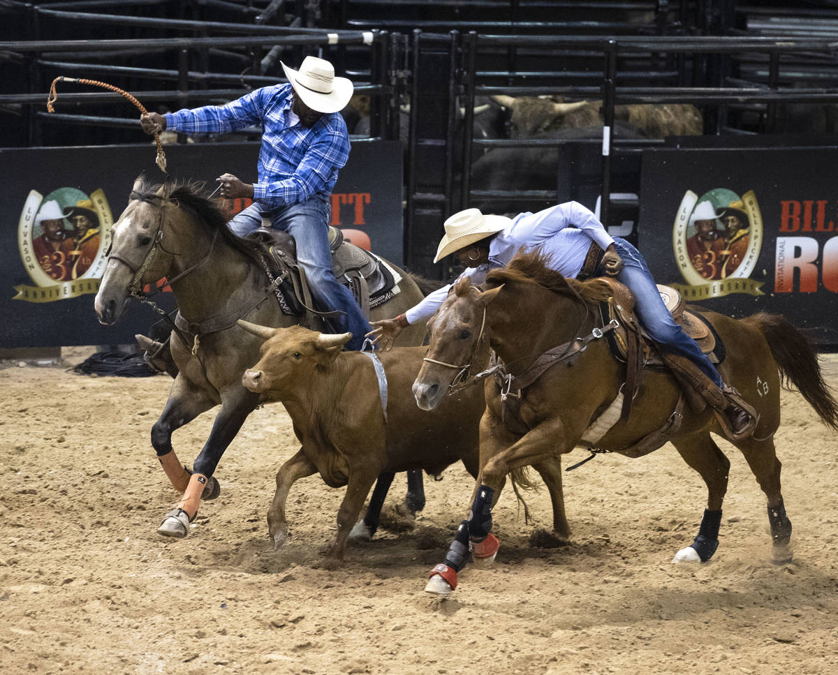 Azja Bryant, of Huntsville, Texas, participates in calf wrangling competition at the Bill Picke ...