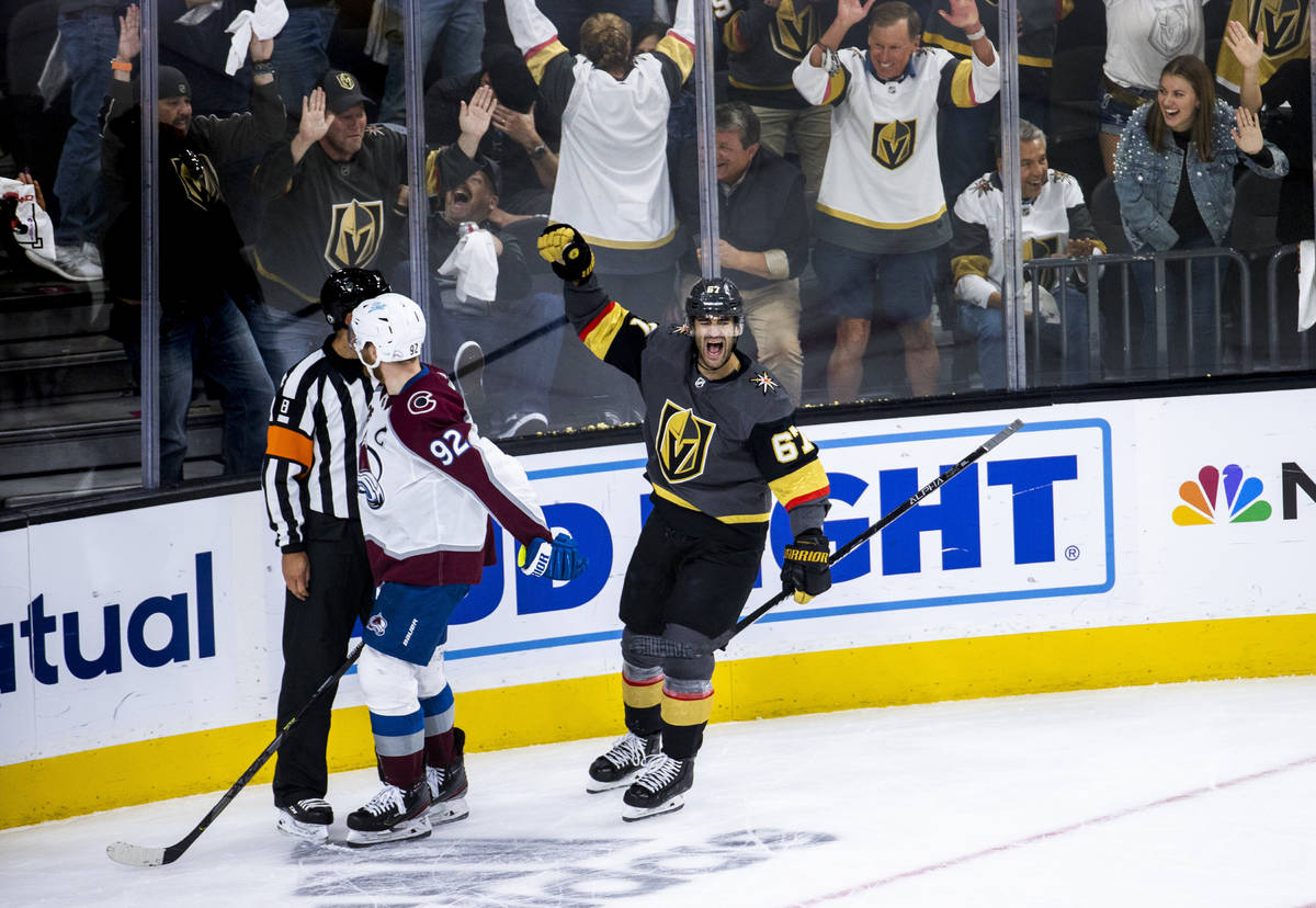 Golden Knights left wing Max Pacioretty (67) yells in elation after scoring over the Colorado A ...