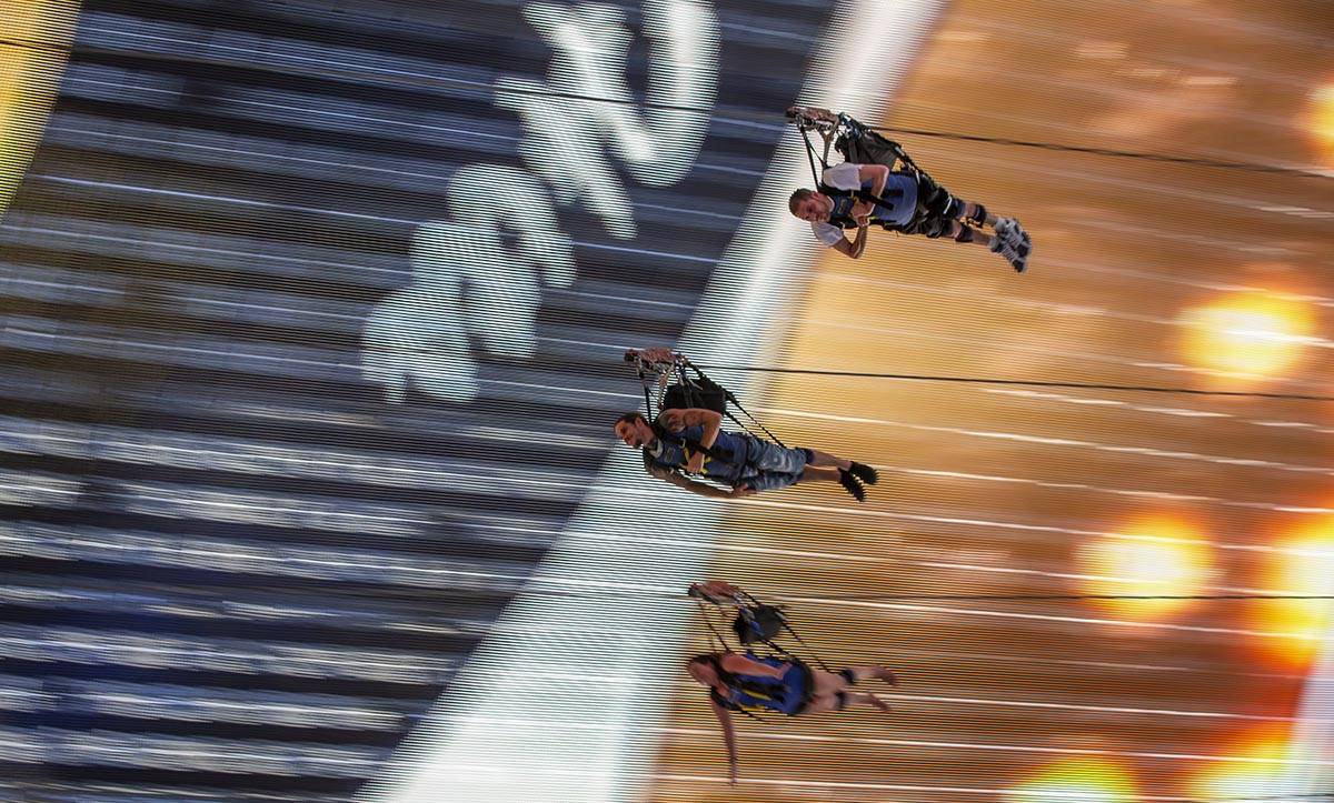 Slotzilla glide near the canopy during a run down the zipline at the Fremont Street Experience ...