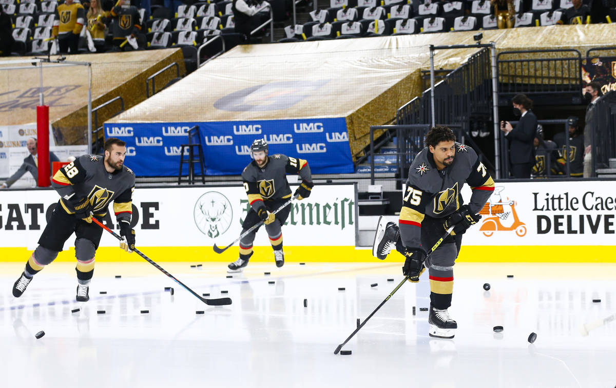 Golden Knights' Ryan Reaves (75) skates onto the ice with teammates to warm up before taking on ...
