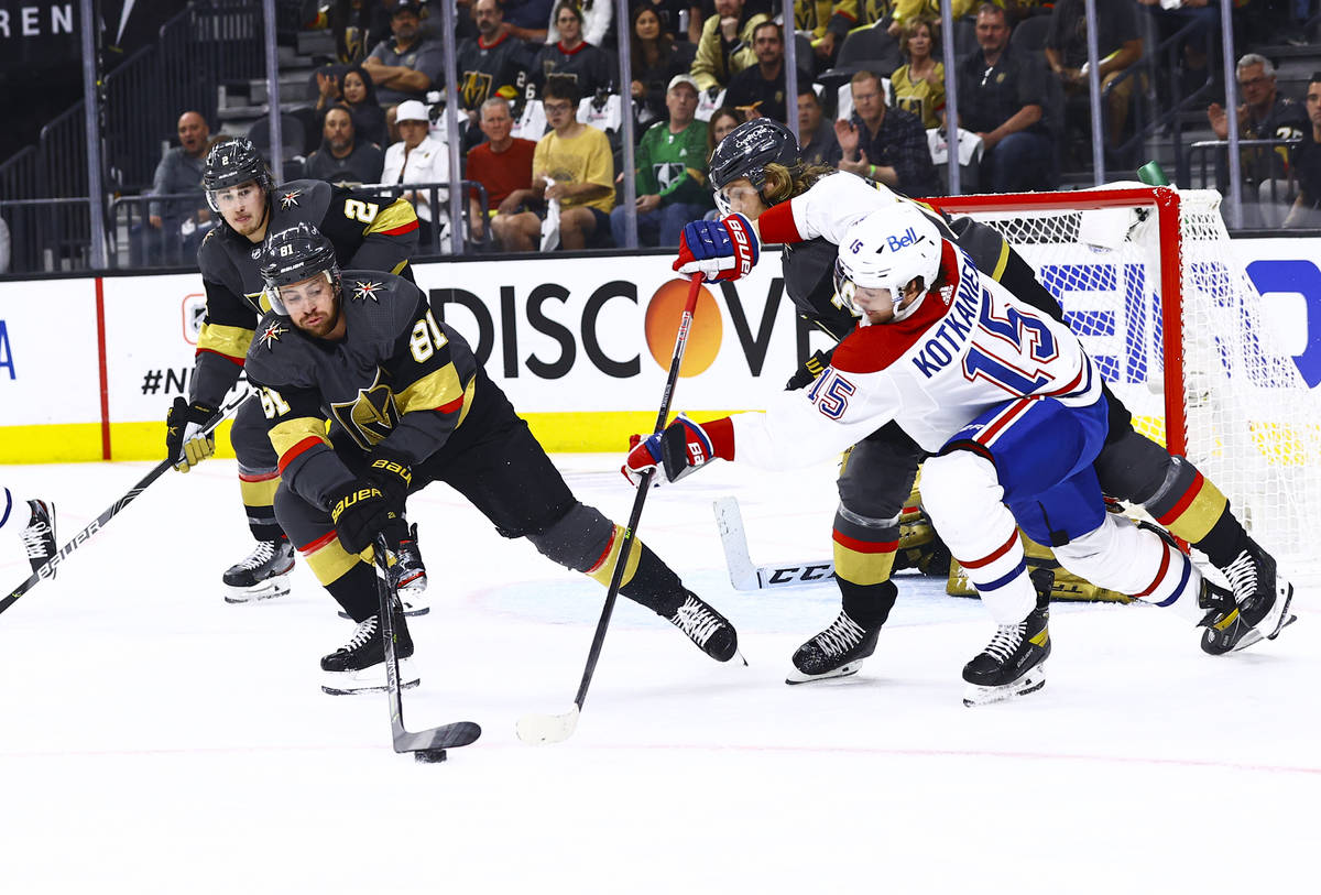 Golden Knights' Jonathan Marchessault (81) gets to the puck before Montreal Canadiens' Jesperi ...