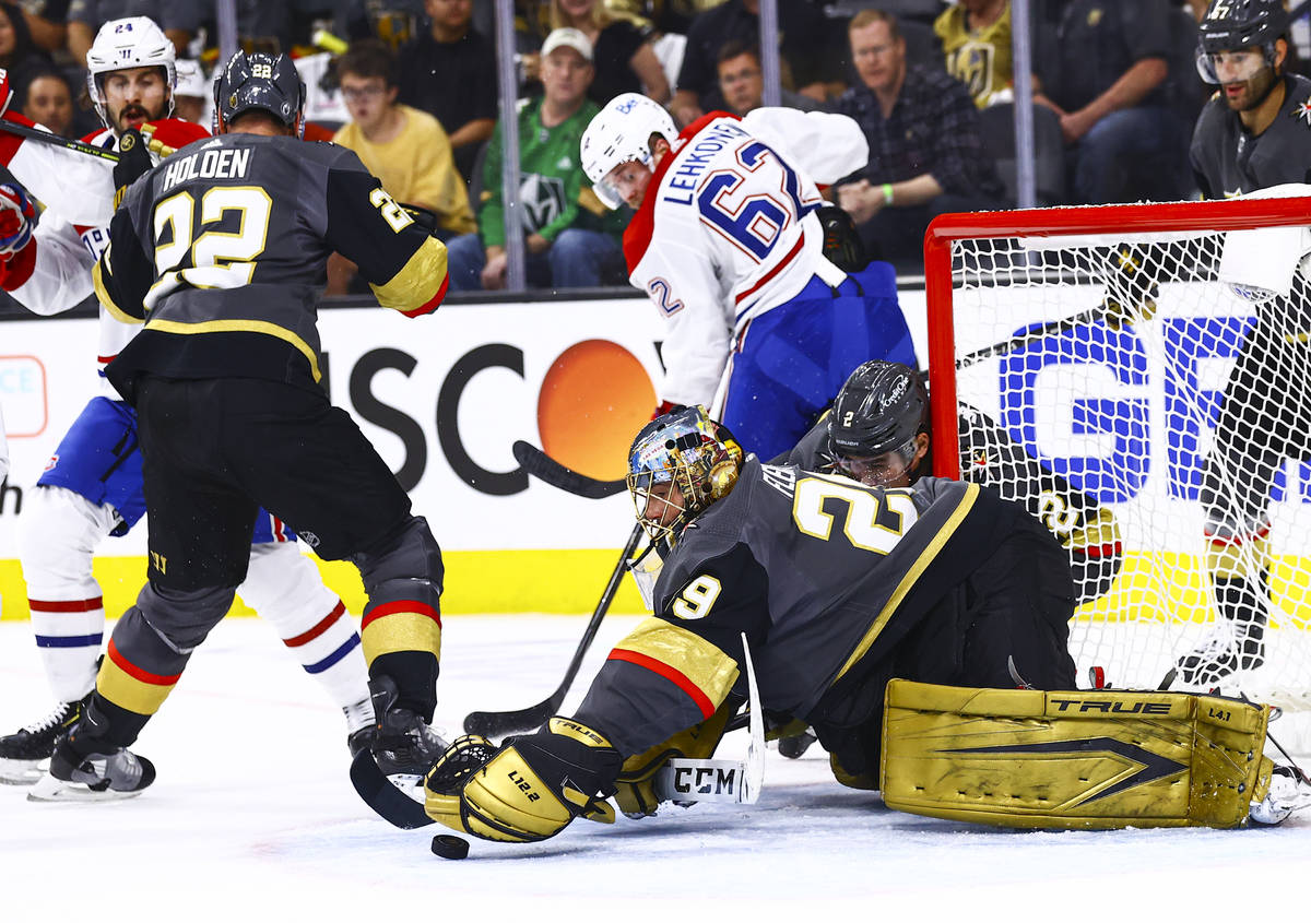 Golden Knights goaltender Marc-Andre Fleury (29) stops the puck in front of Montreal Canadiens' ...