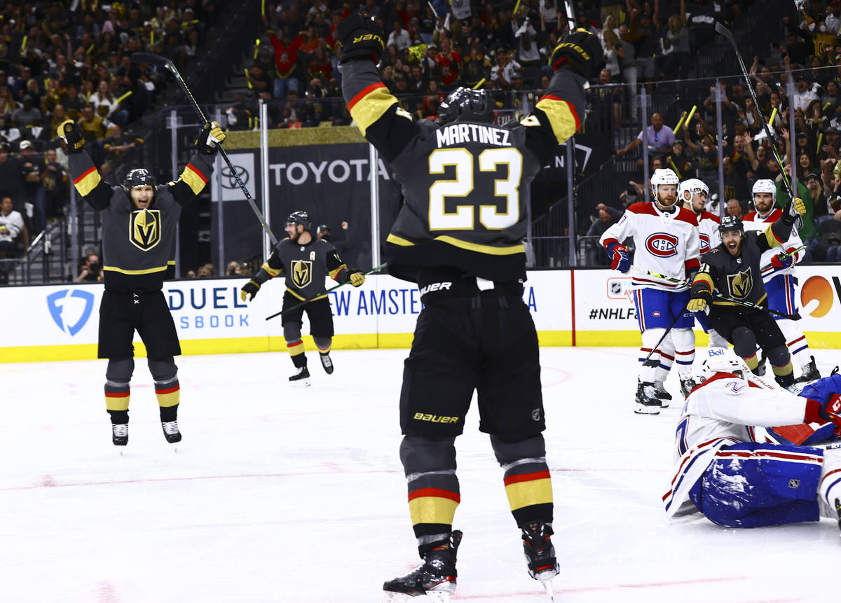 Golden Knights’ Alec Martinez (23) celebrates his goal during the second period of Game ...