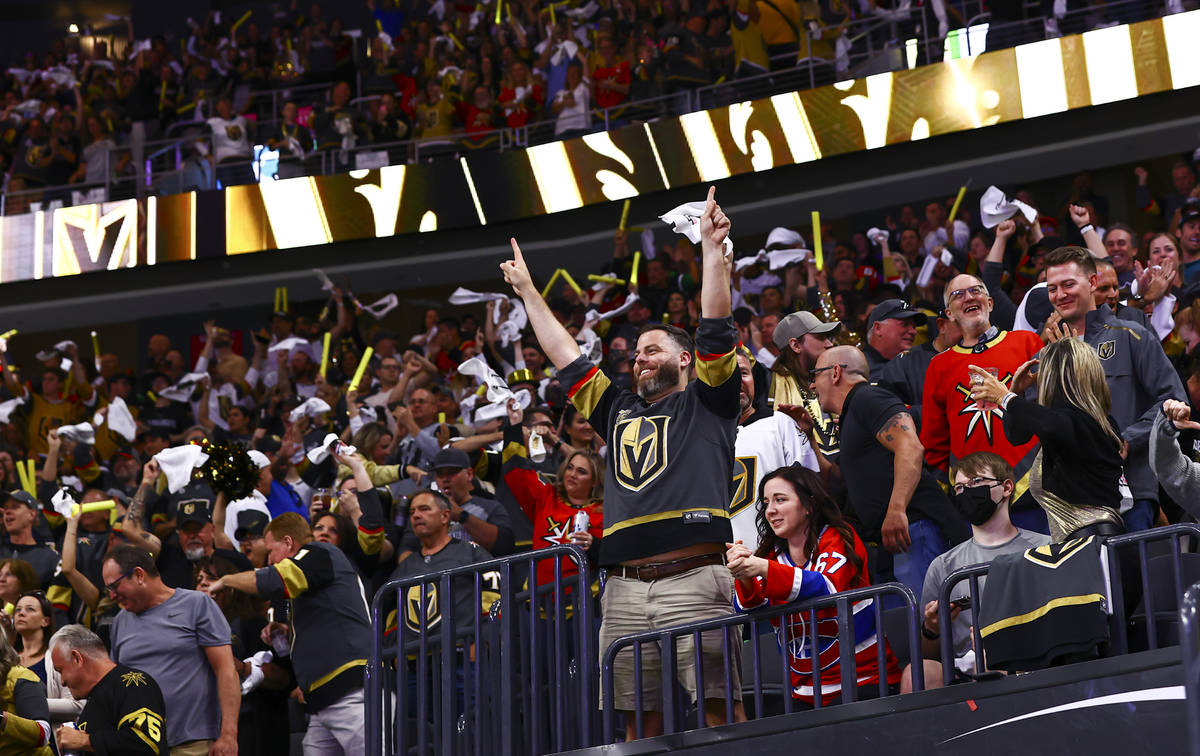 Golden Knights fans celebrate a goal by defenseman Alec Martinez, not pictured, during the seco ...