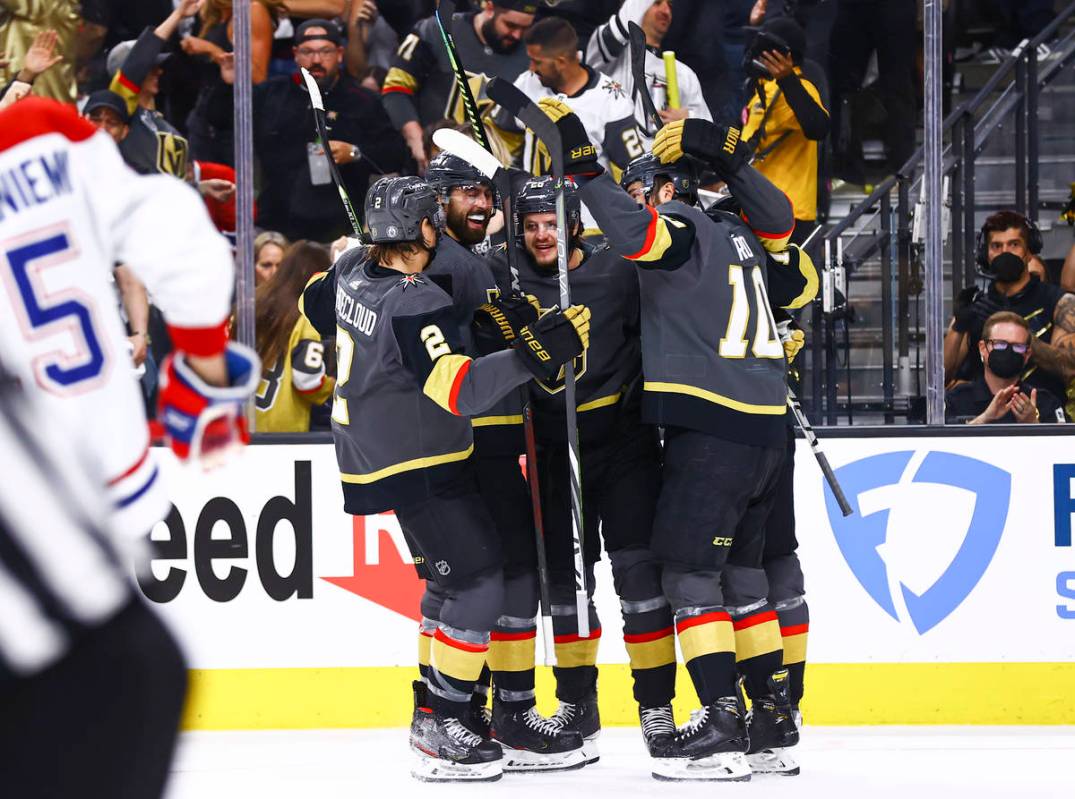 Golden Knights’ Mattias Janmark, third from left, celebrates his goal with teammates dur ...