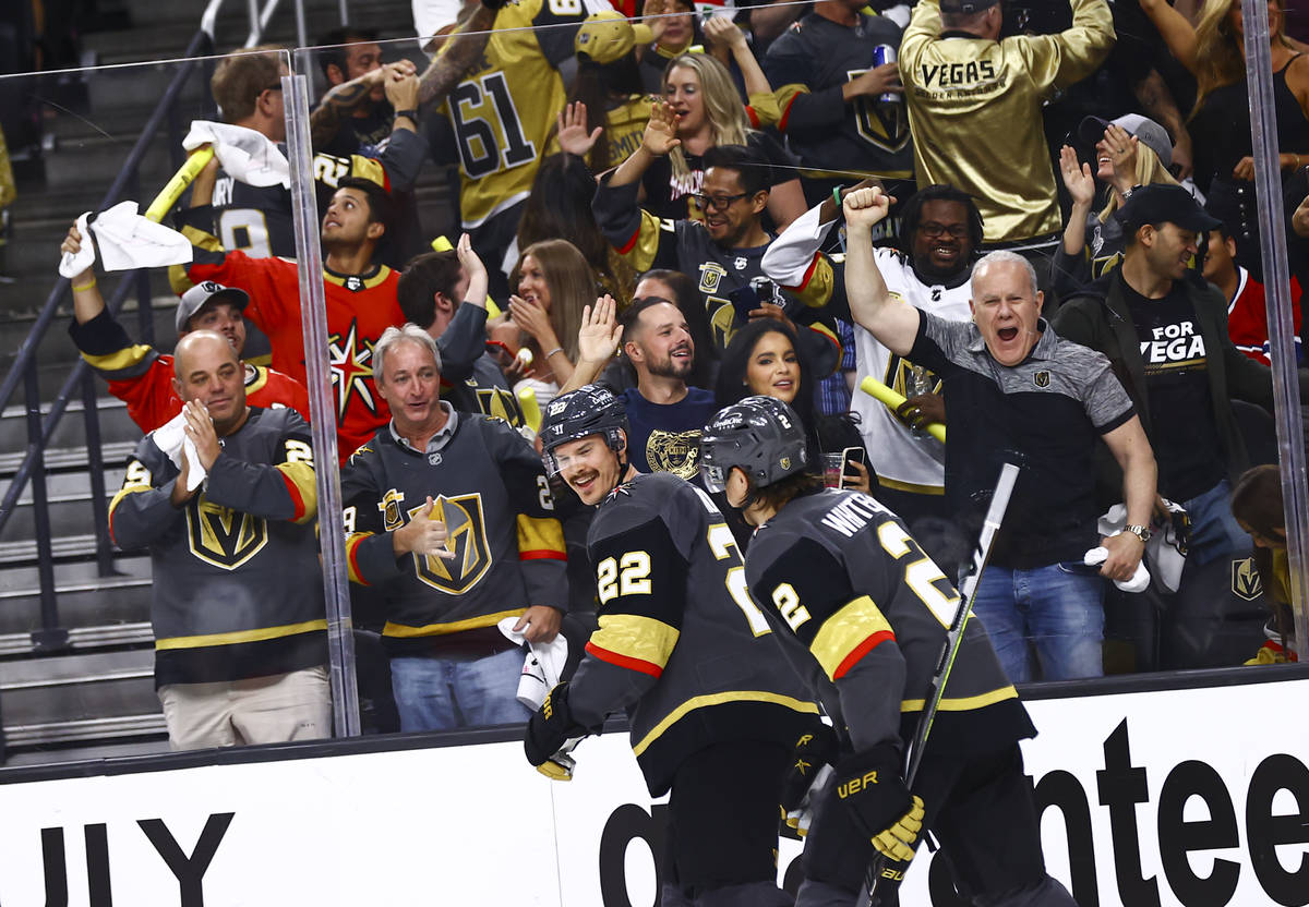 Golden Knights fans celebrate after a goal by Mattias Janmark, not pictured, during the second ...