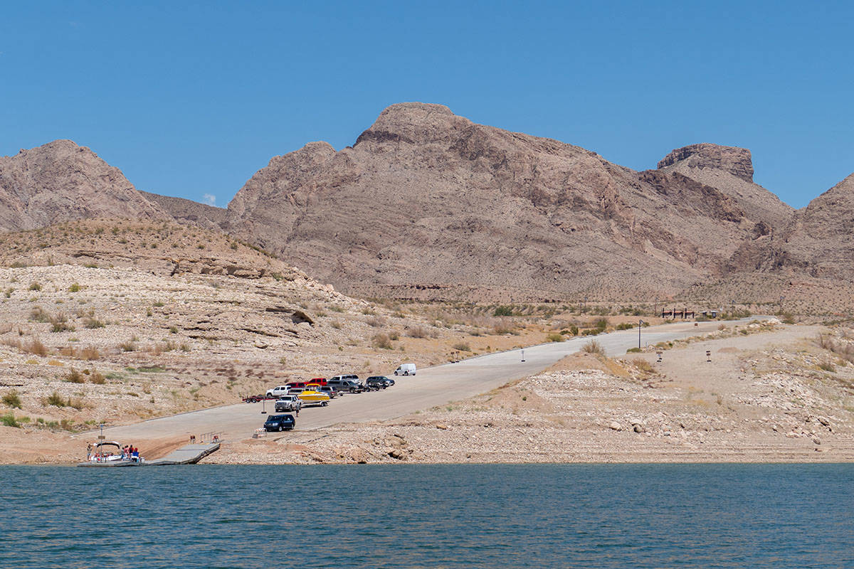 Vehicles line up on the South Cove boat launch ramp at the eastern end of Lake Mead in this pho ...