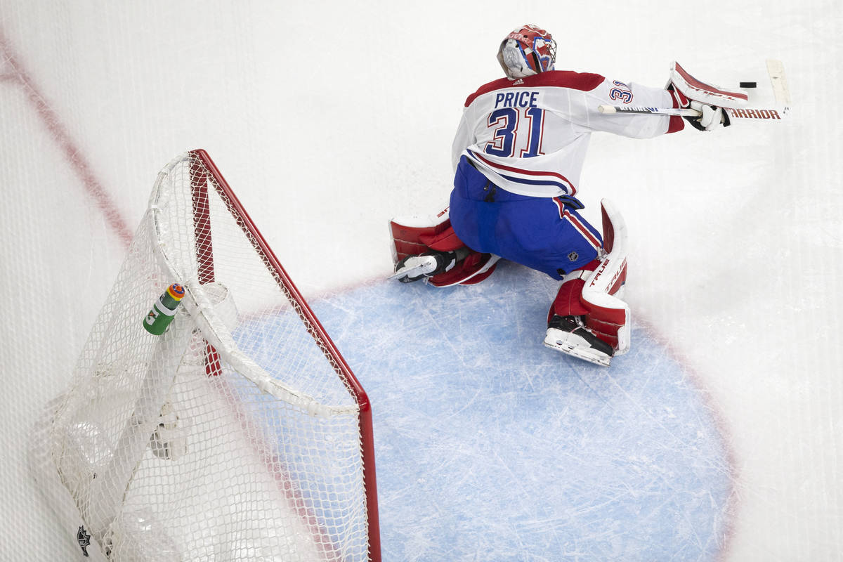 Canadiens goaltender Carey Price (31) blocks a Golden Knights shot during the first period of G ...