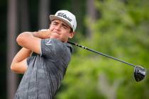 Garrick Higgo, of South Africa, hits off the third tee during the final round of the Palmetto C ...