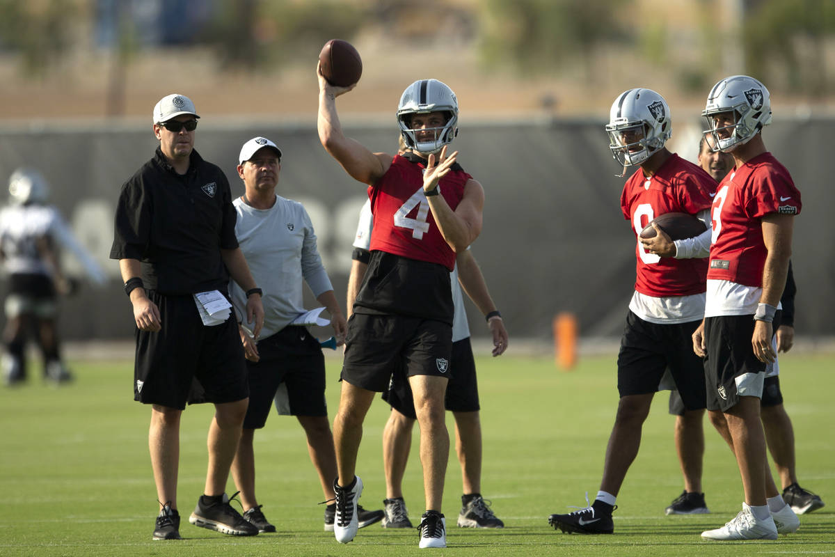 Raiders quarterback Derek Carr (4) throws the football during an NFL football practice on Tuesd ...