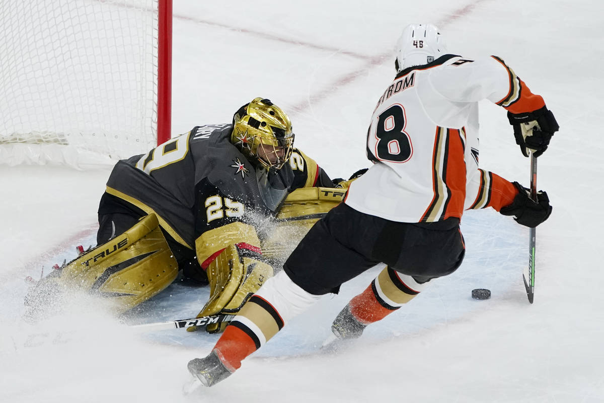 Vegas Golden Knights goaltender Marc-Andre Fleury (29) blocks a shot by Anaheim Ducks center Is ...