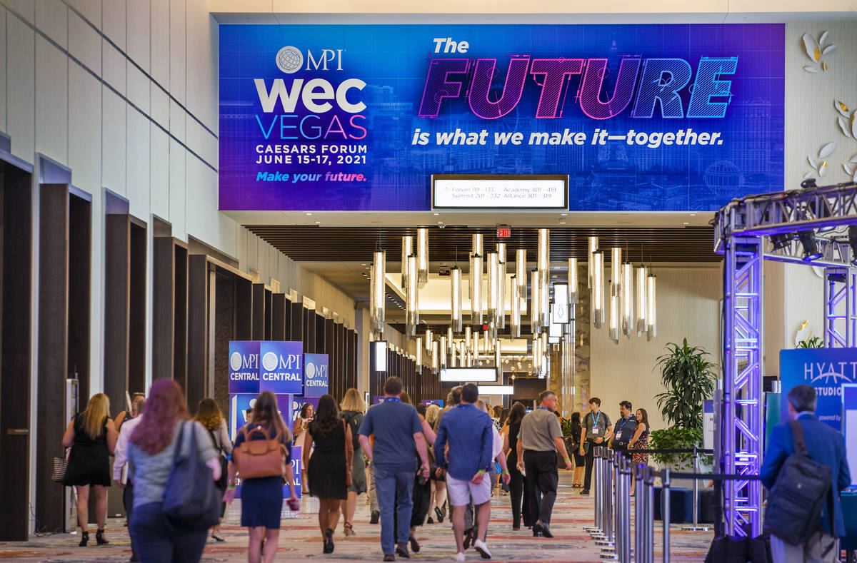 Hybrid Event Example: MPI WEC Vegas. Photo showing attendees entering the venue. 