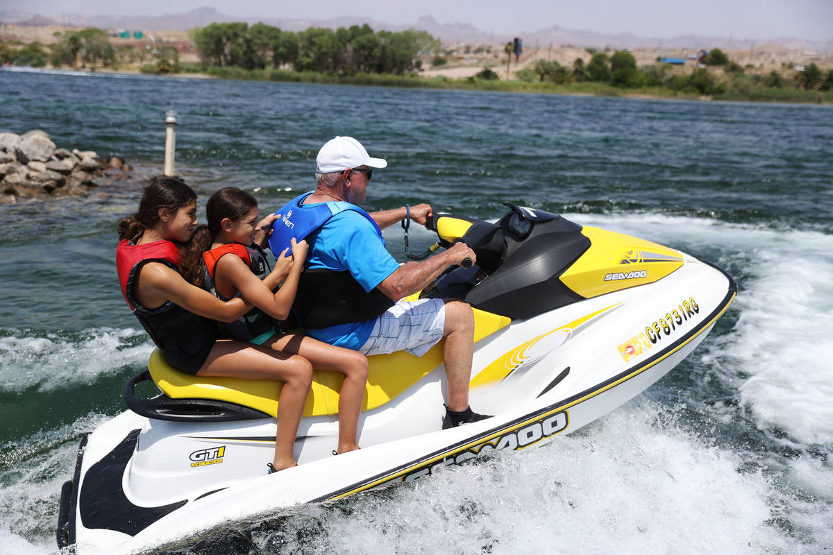 Tara Terrones, 13, from left, with her sister Tessa, 10, and grandfather Rick Fringer, take off ...