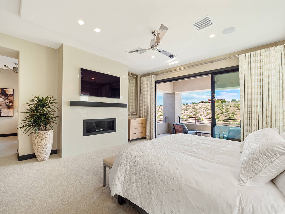 The master bedroom is on the second floor. (LVREAL) “Unwind in an extraordinary master suite, ...