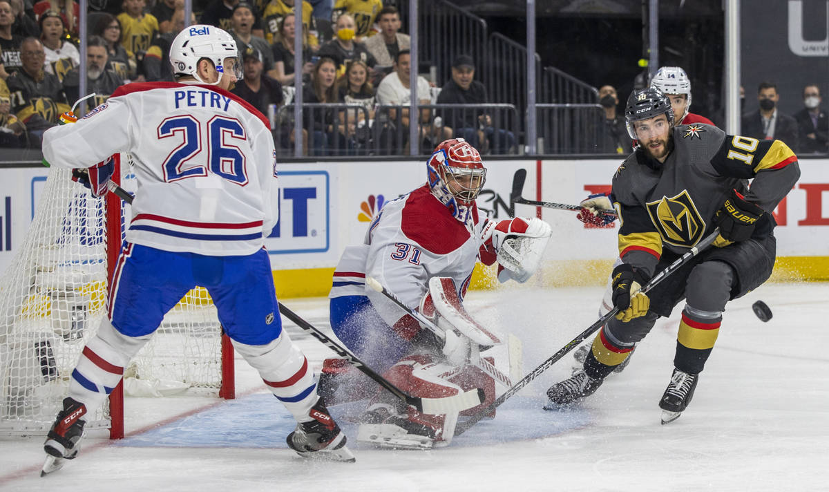 Golden Knights center Nicolas Roy (10) looks in the puck while closing in on Montreal Canadiens ...
