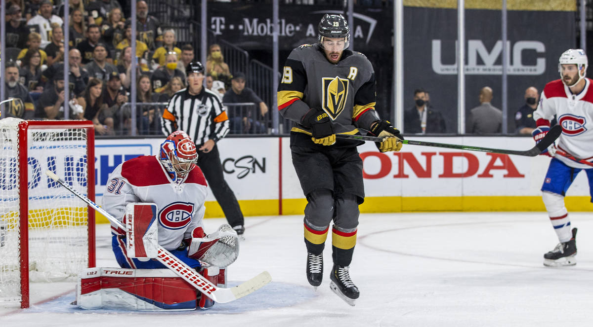 Montreal Canadiens goaltender Carey Price (31) traps the puck after Golden Knights right wing R ...