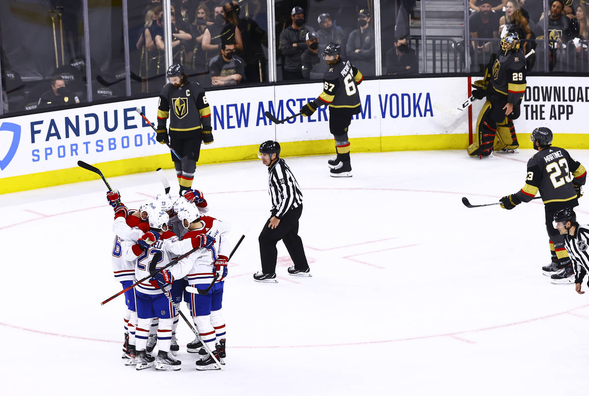 The Montreal Canadiens celebrate after scoring the second of two goals against the Golden Knigh ...