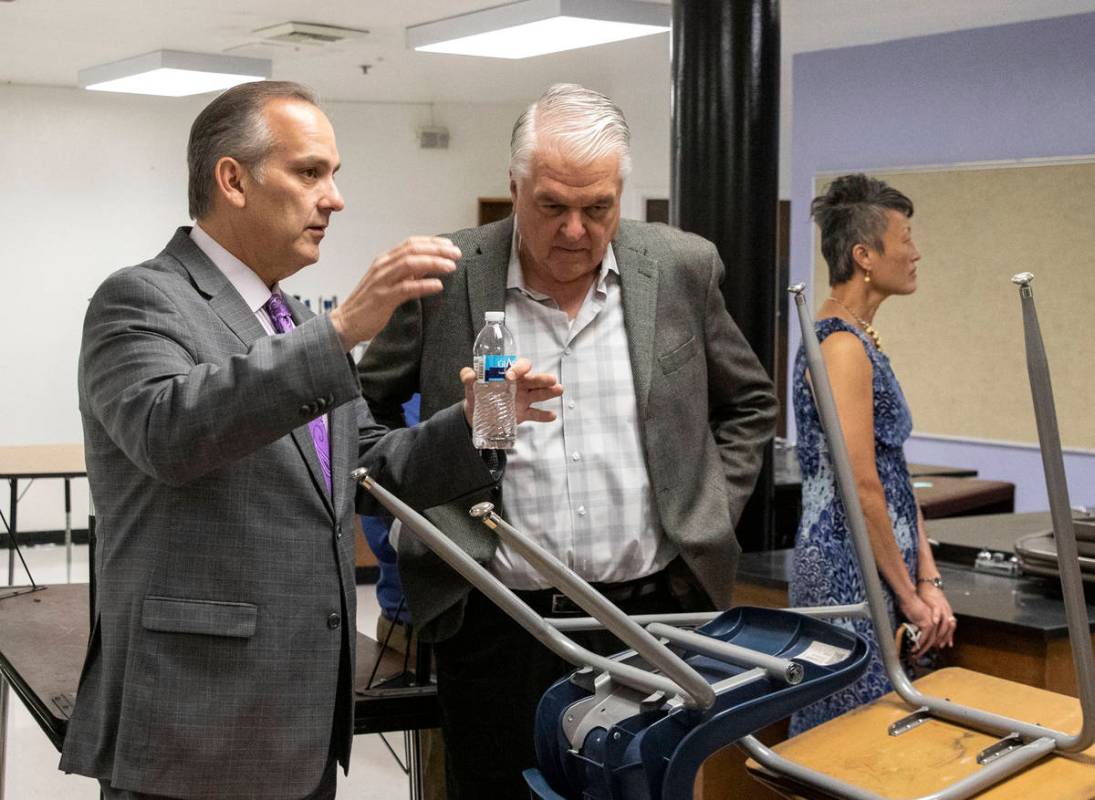 The Clark County School District Superintendent Jesus Jara, left, and Gov. Steve Sisolak discus ...