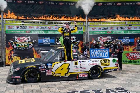 John Hunter Nemechek celebrates in Victory Lane after winning a NASCAR Truck Series auto race a ...