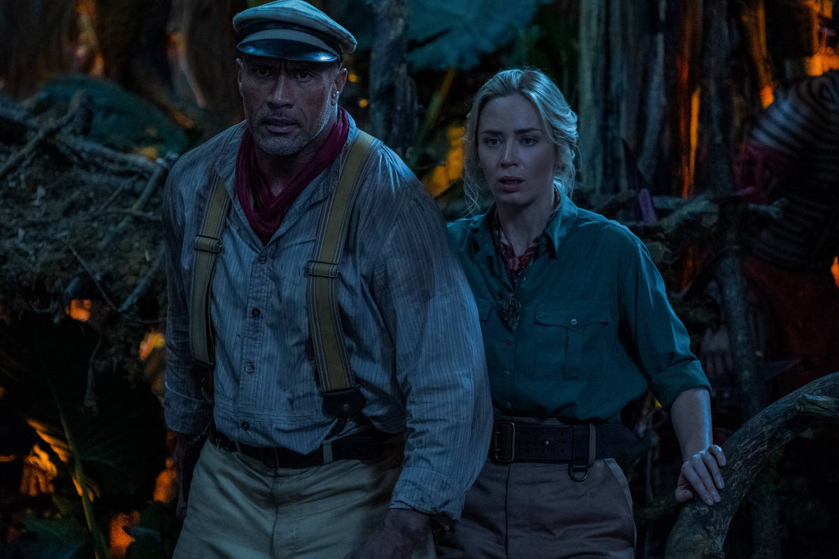 Dwayne Johnson is Frank Wolff and Emily Blunt is Lily Houghton in Disney’s JUNGLE CRUISE ...