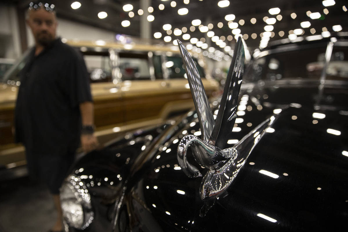 A swan hood ornament is seen on a car showcased in the Barrett-Jackson auction at the Las Vegas ...