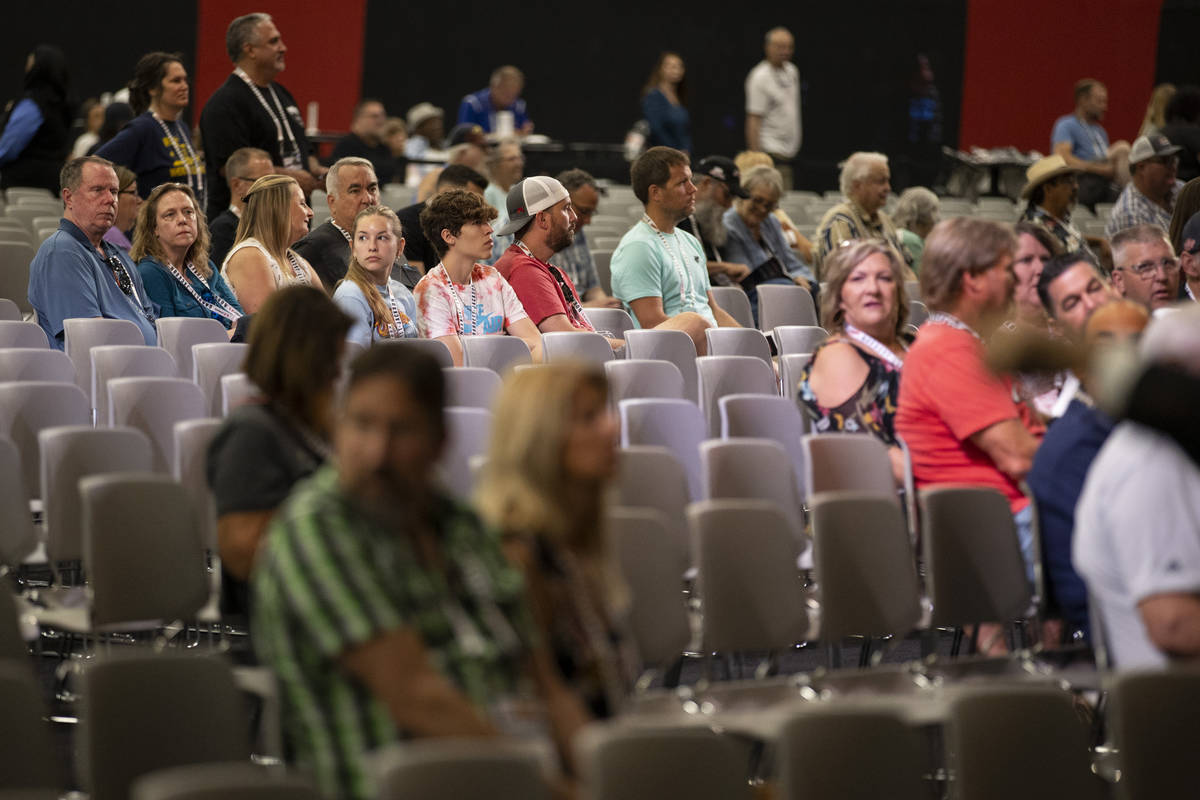 People attend the Barrett-Jackson auction at the Las Vegas Convention Center West Hall in Las V ...