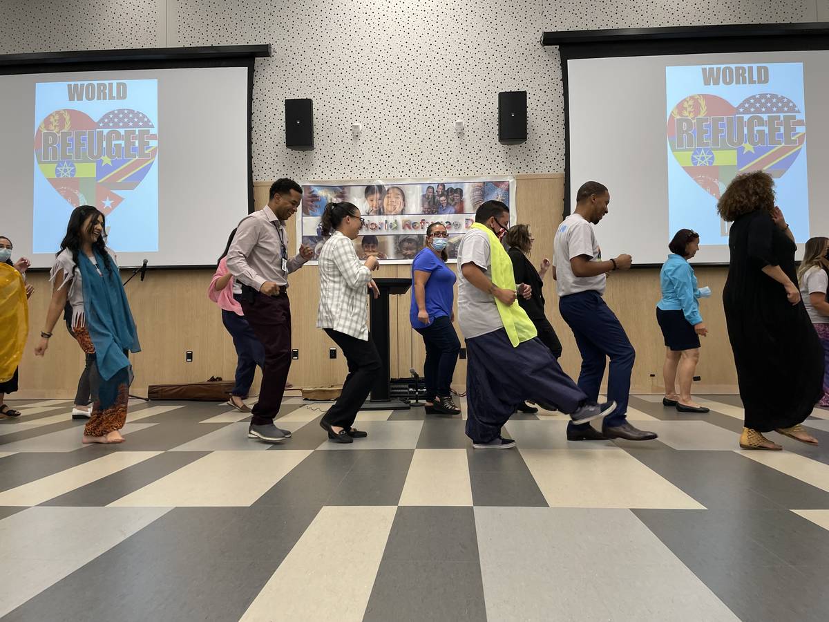 World Refugee Day event attendees dance to the "Cupid Shuffle" at the East Las Vegas Library on ...
