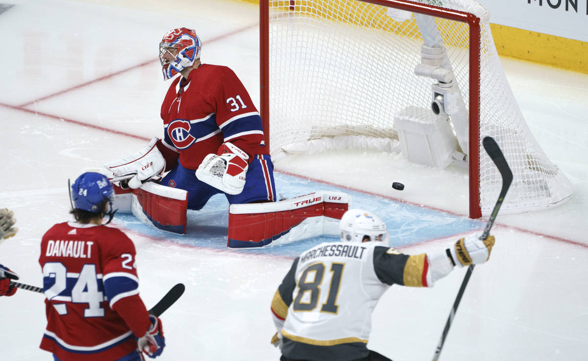 Vegas Golden Knights' Jonathan Marchessault celebrates a goal by Alex Pietrangelo on Montreal C ...